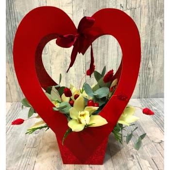 Arrangement with orchids in tall box heart  shape